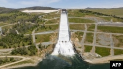 In this aerial photo, water is released from Lake Oroville down a spillway in Oroville, California, on April 16, 2023.