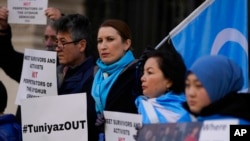 Activists and community members protest outside the British Foreign Office in London, Feb. 13, 2023. They sought a meeting with the foreign secretary to highlight concerns for their compatriots in the Chinese Xinjiang Uyghur Autonomous Region.