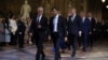 Prime Minister Sir Keir Starmer (left) and Conservative leader Rishi Sunak (right) lead MPs through the Central Lobby at the Palace of Westminster ahead of the State Opening of Parliament in London, July 17, 2024