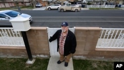 FILE - Lupe Martinez, an activist and former farmworker, poses for a photo at his home in Delano, Calif., on Feb. 5, 2023.