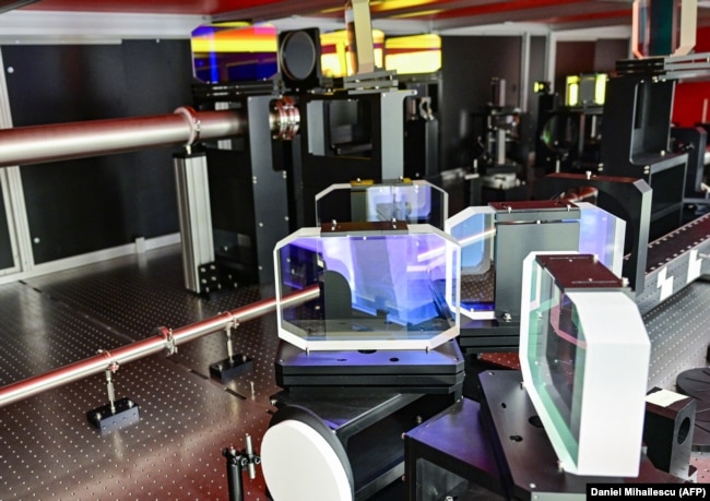 Partial view of the special mirrors systems used for light amplification and light's noise filtering of laser beam of the "Extreme Light Infrastructure-Nuclear Physics"- ELI-NP laser in Magurele city near Bucharest, Romania, March 26, 2024. (Photo by Daniel MIHAILESCU / AFP)