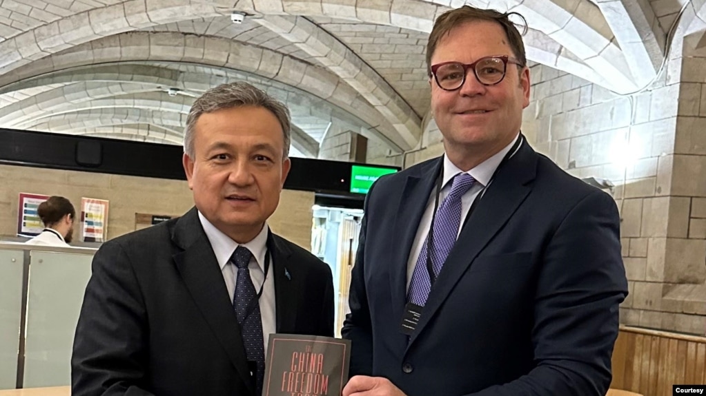 World Uyghur Congress President Dolkun Isa, left, with Dean Baxendale of Optimum Publishing International, at a March 14, 2024, event marking the publication of his book, The China Freedom Trap. (Photo courtesy Optimum Publishing International)