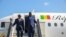 Senegal's President Macky Sall (R) and Comoros President Azali Assoumani (L) arriving at Pulkovo airport in Saint Petersburg to attend the Saint Petersburg International Economic Forum on June 17, 2023. 