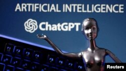 FILE - The ChatGPT logo and the words Artificial Intelligence are seen in this illustration photo taken May 4, 2023.