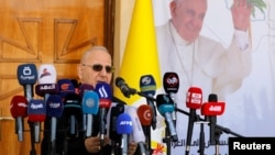 FILE - Iraq's Chaldean Catholic leader, Cardinal Louis Sako, speaks during a news conference ahead of a visit to Iraq by Pope Francis, in Baghdad, Iraq, March 3, 2021.