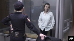 FILE - Alsu Kurmasheva attends a court hearing during her imprisonment in Kazan, Russia, April 1, 2024.