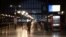 FILE - A traveler waits in front of platforms at Gare du Nord train station during nationwide strikes and protests against the government's pension reform plan, in Paris, France, Jan. 31, 2023.
