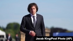 Prime Minister of Georgia Irakli Kobakhidze arrives to attend the European Political Community summit at Blenheim Palace in Woodstock, Oxfordshire, England, July 18, 2024. (Jacob King/Pool Photo via AP)