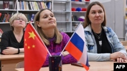 Women attend a Chinese lesson at the ChineseFirst language center, in the town of Reutov, outside Moscow, Russia, March 17, 2023.