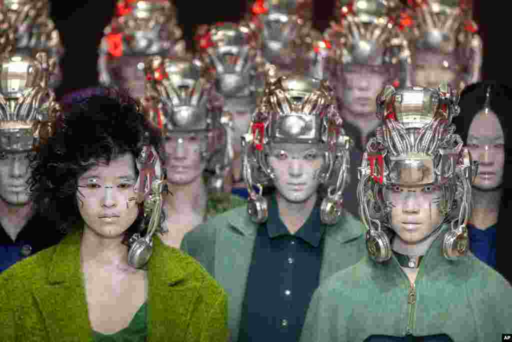 Models present creations by Chinese fashion studio D. Martina Queen during a show at China Fashion Week in Beijing.