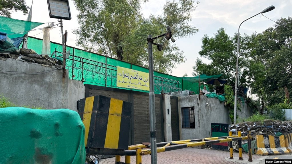 Guards watch over the personal residence of former Pakistani Prime Minister Imran Khan in Lahore. 