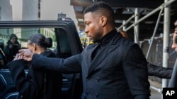 Actor Jonathan Majors leaves Criminal Court with his girlfriend Megan Good after his sentencing in Manhattan in New York, April 8, 2024.