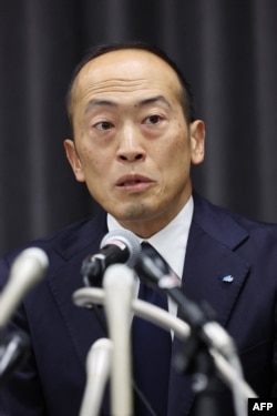 President of Kobayashi Pharmaceutical Co.  Akihiro Kobayashi answers questions during a press conference in Osaka, March 29, 2024. (JIJI Press/AFP)