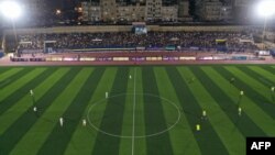 An aerial picture shows the final match of a local football tournament at the municipal stadium in Idlib, Syria, Aug. 18, 2023.