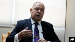 Cook Islands Prime Minister Mark Stephen Brown talks to Associated Press reporters at U.N. regional office in Bangkok, May 15, 2023, at a U.N. climate change conference.