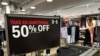 A sale sign is displayed at a retail store in Rosemont, Illinois, June 25, 2024.