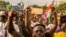 Niger's junta supporters take part in a demonstration in front of a French army base in Niamey, Niger, Aug. 11, 2023.
