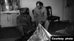 FILE - Air Force Brigadier General Roger Ramey, left, and Col. Thomas DuBose look over a wind-forecasting device at Fort Worth Army Airfield brought from Roswell, New Mexico, July 8, 1947. (Photo courtesy of Fort Worth Star-Telegram Photograph Collection, Special Collections, The University of Texas at Arlington Library, Arlington, Texas)