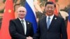 (FILE) Russian President Vladimir Putin shakes hands with Chinese President Xi Jinping in Beijing, China, October 2023.