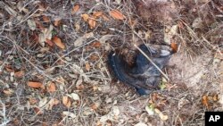 FILE - A boot from a migrant crossing the U.S.-Mexico border is seen in Brooks County, Texas, in this March 2, 2021, photo released by the Brooks County Sheriff's Office. On June 23, 2023, the U.S. Supreme Court ruled the federal government controls migration policy, not states.
