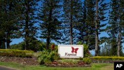 A Kapalua Ridge Villas sign is seen, Oct. 3, 2023, in Lahaina, Hawaii. The resort will re-open on Oct. 8, 2023, as the first phase for tourism returning to West Maui.