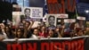 Relatives of Israeli hostages taken captive on October 7 by Palestinian militants in Gaza hold portraits of those taken during a demonstration in Tel Aviv, Israel, calling for their release, May 4, 2024.