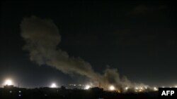 Smoke billows over Rafah in the southern Gaza strip during Israeli bombardment on Dec. 28, 2023.