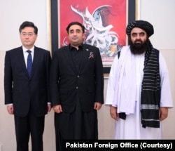 FILE - Chinese Foreign Minister Qin Gang, left, Pakistani Foreign Minister Bilawal Bhutto Zardari, center, and Afghan Taliban Foreign Minister Amir Khan Muttaqi before opening trilateral talks in Islamabad, May 6, 2023 (Photo courtesy of Pakistan Foreign Office)