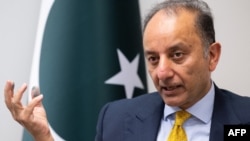 FILE - Pakistani Petroleum Minister Musadik Malik speaks during an interview with AFP at the Embassy of Pakistan in Washington, May 8, 2023.