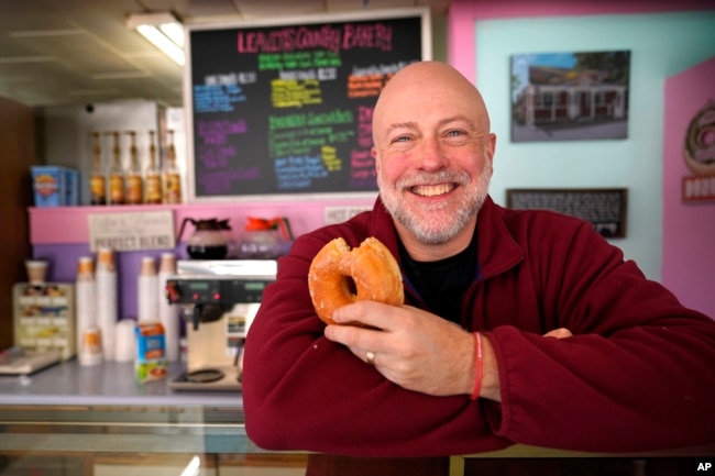 Owner Sean Young poses at Leavitt's Country Bakery, Thursday, April 13, 2023. (AP Photo/Robert F. Bukaty)