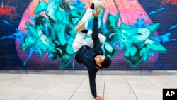 FILE - Breakdancer Victor Montalvo, 27, of Kissimmee, Fla., performs in New York City on June 22, 2021. (AP Photo/Ted Shaffrey)