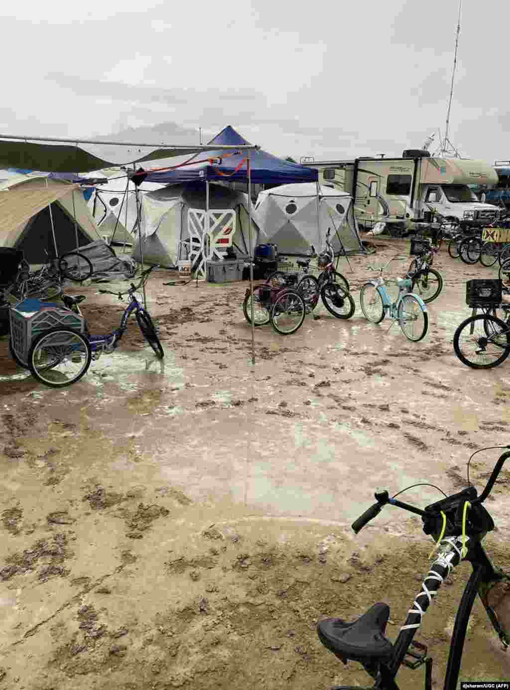 This handout provided courtesy of Instagram user djsharam, Sept. 3, 2023 shows bicycles sitting amongst flooding on a desert plain after heavy rains on Sept. 2, 2023, in Nevada&#39;s Black Rock desert.&nbsp;