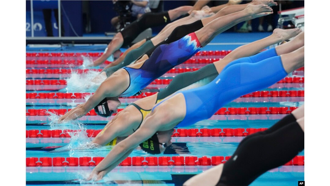 Swimmer Katie Ledecky takes off in the women's 800-meter freestyle final at the Summer Olympics in Nanterre, France, Aug. 3, 2024.
