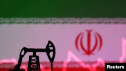 An illustration featuring an Iranian flag and an oil pump jack miniature model, Oct. 9, 2023. 