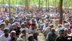 FILE - Rohingya refugees from Myanmar gather at a camp in Bangladesh on Aug. 25, 2022. A boat carrying Rohingya migrants from Myanmar capsized in the Bay of Bengal, killing at least 17 people, officials said on Aug.10, 2023.