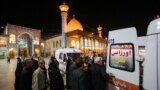 FILE - Emergency personnel transport the injured following a shooting at Iran's Shah Cheragh mausoleum in the Fars province capital, Shiraz, on Aug. 13, 2023. 