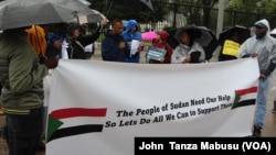 Sudanese Americans demonstrate at the While House to urge support for people affected by conflict in Sudan, Sept. 23, 2023. Whashington DC.