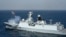 FILE - The Pakistan Navy Ship (PNS) Taimur, a Type 054A ship designed and built for Pakistan by China, fires rounds during a naval exercise in the Arabian Sea near Pakistan's port city of Karachi on Feb. 13, 2023.