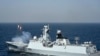 FILE - The Pakistan Navy Ship (PNS) Taimur, a Type 054A ship designed and built for Pakistan by China, fires rounds during a naval exercise in the Arabian Sea near Pakistan's port city of Karachi on Feb. 13, 2023.