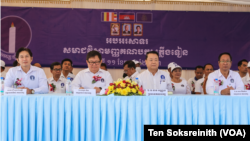 FILE - Candlelight Party leaders preside over the party's congress in Siem Reap province, Feb. 11, 2023. 