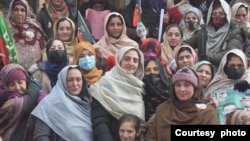 In this undated photo, Suriya Bibi poses with supporters in Chitral, Pakistan. Bibi made history in early February 2024 by becoming the first woman from the Chitral district to win an assembly seat through a direct election. (Photo courtesy of Azhar Uddin)