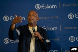 FILE - Electricity Minister Kgosientso Ramokgopa addresses Eskom workers at the Lethabo Power Station near Sasolburg, South Africa, on March 23, 2023.