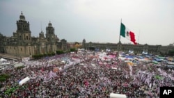 Supporters of ruling party presidential candidate Claudia Sheinbaum attend her closing campaign rally at the Zocalo in Mexico City, May 29, 2024.