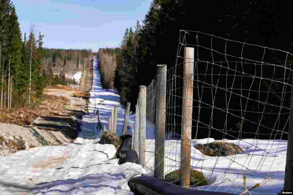 A border fence being built by Finland is seen along the border with Russia.