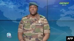 FILE - This video frame grab from the Office of Radio and Television of Mali shows Colonel Abdoulaye Maiga, Malian government spokesman, reading a statement on television July 31, 2023. Maiga announced on April 10, 2024, that all political activities in Mali had been suspended.