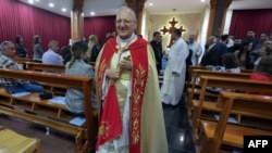 FILE - Cardinal Louis Raphael Sako, the Patriarch of the Chaldean Catholic Church, leads a mass at in Arbil, the capital of Iraq's northern autonomous Kurdish region, Nov. 11, 2023. 