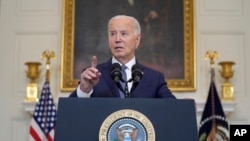 FILE - President Joe Biden delivers remarks on the Middle East, from the State Dining Room of the White House, May 31, 2024.