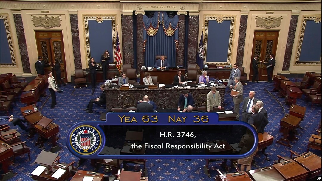 In this image from Senate Television, the final vote of 63-36 shows passage of the bill to raise the debt ceiling, June 1, 2023, in the Senate at the Capitol in Washington.