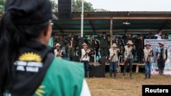 FARC dissidents attend a meeting with peasant communities in Yari, Colombia, April 16, 2023. 