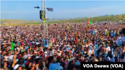 People gather for the funeral of slain rights activist Gilaman Wazir in Asad Khel, North Waziristan, Pakistan, on July 12, 2024.